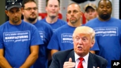 FILE - Then-Republican presidential candidate Donald Trump speaks during a campaign stop in Dayton, Ohio, Sept. 21, 2016. In the wake of Trump's victory, Democrats are looking at how to attract more working-class voters.