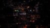 FILE - Partial view of the neighborhood Petare hill, March 10, 2019, during a massive power outage which has left Caracas and much of the country without communications, water and electricity.