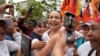 FILE - Supporters embrace opposition leader Maria Corina Machado during a rally in San Antonio, Venezuela, April 17, 2024. She has called for hundreds of demonstrations Aug. 17, 2024, against the election victory claimed by Nicolas Maduro,