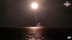 The Emperor Alexander III nuclear submarine of the Russia navy test-fires a Bulava intercontinental ballistic missile from the White Sea. (Russian Defense Ministry Press Service via AP)