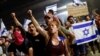 Protesters block Ayalon Highway during a demonstration following a parliament vote on a contested bill that limits Supreme Court powers to void some government decisions, in Tel Aviv, July 25, 2023. 
