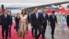 In this photo released by Xinhua News Agency, Syrian President Bashar Assad, center right, and first lady Asma Assad arrive in Hangzhou, China, on Sept. 21, 2023. (Huang Zongzhi/Xinhua via AP, File)