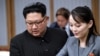 Pemimpin Korea Utara Kim Jong Un dan saudara perempuannya Kim Yo Jong di dalam zona demiliterisasi yang memisahkan kedua Korea, Korea Selatan, 27 April 2018. (Foto: via Reuters)