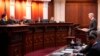 FILE - Attorney Eric Olson, far right, argues before the Colorado Supreme Court, Dec. 6, 2023, in Denver. The court on Dec. 19 declared former President Donald Trump ineligible for the White House under the U.S. Constitution’s insurrection clause.