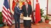 U.S. Secretary of State Antony Blinken, left, shakes hands with Tonga Prime Minister Hu'akavemeiliku Siaosi Sovaleni in Nuku'alofa, Tonga, July 26, 2023.
