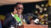 FILE - Zimbabwe President Emmerson Mnangagwa speaks during his inauguration at the National Sports Stadium in Harare, Sept. 4, 2023. In his new year message Mnangagwa has predicted the country's economy will turn around this year following the recent discovery of oil and gas. 