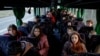 Children who went to a Russian-organized summer camp from non-government controlled territories, and were then taken to Russia, wait for departure to Kyiv after returning via the Ukraine-Belarus border in Ukraine's Volyn region on April 7, 2023. (Valentyn Ogirenko/Reuters)