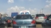 Wadansu motoci a kan layin neman man fetir