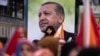 Supporters of People's Alliance's presidential candidate Recep Tayyip Erdogan attend a campaign rally in Istanbul, Turkey, May 12, 2023.