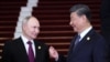Russian President Vladimir Putin is welcomed by Chinese President Xi Jinping during a ceremony at the Belt and Road Forum in Beijing, China, Oct. 17, 2023. (Sputnik/Sergei Savostyanov/Pool via Reuters)