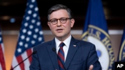 FILE - Speaker of the House Mike Johnson speaks during a news conference in Washington, May 7, 2024. On Tuesday, he vowed to press ahead with requiring proof of citizenship for new voters as part of a bill to avoid a partial government shutdown in three weeks.