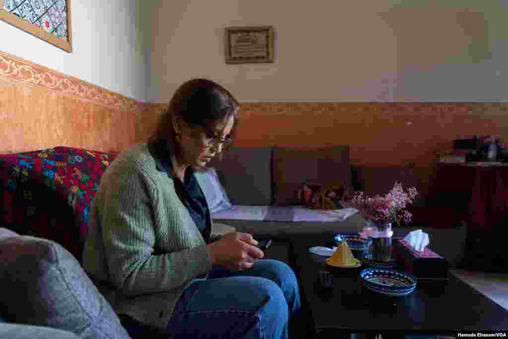 Etemad Abu Tahoun, like hundreds of Palestinians, is fundraising to pay for the evacuation of a loved one from Gaza. Her son, Momen, whose home and university in the north were bombed, now lives in fear of another Israeli military assault. Cairo, Egypt, April 1, 2024. 