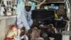 Des hommes blessés après une vague d'attentats-suicides dans le nord-est du Nigeria, à Maiduguri, le 29 juin 2024.