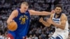 Nikola Jokić u duelu sa Karlom Entonijem Taunsom (Foto: Jesse Johnson-USA TODAY Sports)