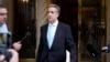 Michael Cohen leaves his apartment building on his way to Manhattan criminal court in New York City, May 14, 2024. 