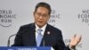 FILE - Chinese Premier Li Qiang delivers his speech during the opening ceremony of the World Economic Forum Annual Meeting of the New Champions in Dalian, in China's northeastern Liaoning province, June 25, 2024.