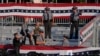Law enforcement officers gather at the campaign rally site for Republican presidential candidate and former President Donald Trump in Butler, Pennsylvania, July 13, 2024.