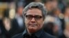 Film director Rasoulof fled Iran on foot, newspaper says