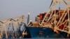 Crews start to remove steel from collapsed bridge in US