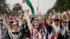 Aksi solidaritas dan doa untuk mendukung rakyat Palestina di Gaza, di Jakarta, Minggu, 7 April 2024. (AP/Dita Alangkara)