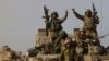 Dakarun Isra'ila, lokacin da suke murnar dawowa daga Gaza (Hoto: AP)