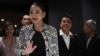 Puea Thai party leader Paetongtarn Shinawatra, known by her nickname Ung Ing and the youngest daughter of former prime minister Thaksin Shinawatra, waves as she leaves a press conference in Bangkok on Aug. 15, 2024. 