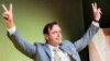 FILE - N-VA leader Bart De Wever arrives to address party members after winning the Belgian federal and regional elections, in Brussels, May 25, 2014. He resigned Aug. 22, 2024, as leader of government coalition talks.