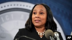Fulton County (Ga.) District Attorney Fani Willis speaks in the county government center during a news conference in Atlanta, Aug. 14, 2023.