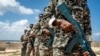 Des soldats participent à un entraînement de l'armée somalienne à Mogadiscio le 19 mars 2024. AFP / Amaury Falt-Brown
