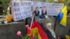 Flowers and candles are placed at the scene, as residents mourn the death of two Ukrainian soldiers in the small southern town of Murnau, Germany, April 29, 2024.