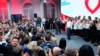 Donald Tusk, leader of Poland's largest opposition party, the Civic Coalition, addresses supporters in Warsaw, Oct. 15, 2023. 