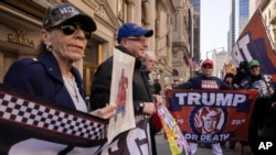 Supporters of former President Donald Trump protest outside of Trump Tower in New York City, April. 3, 2023.