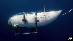 FILE - This photo provided by OceanGate Expeditions shows a submersible vessel named Titan used to visit the wreckage site of the Titanic.