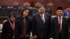 Menteri Sosial Tri Rismaharini, Menteri Keuangan Sri Mulyani, Menko Perekonomian Erlangga Hartarto, Menko Pembangunan Manusia dan Kebudayaan Muhadjir Effendy di Mahkamah Konstitusi di Jakarta, 5 April 2024. (Foto: Adek BERRY/AFP)