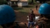 FILE - U.N. peacekeepers patrol the town of Bangassou, Central African Republic, Feb. 15, 2021, amid attacks by armed groups in the region.