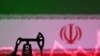 An illustration featuring an Iranian flag and an oil pump jack miniature model, Oct. 9, 2023. 