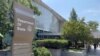 FILE — Signage is seen outside one of the entrances of the U.S. Department of State in Washington, Aug. 6, 2021. The United States said Monday it would resume sales of offensive weapons to Saudi Arabia.