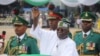 FILE - Nigeria's new President Bola Ahmed Tinubu inspects honor guards after taking an oath of office at a ceremony in Abuja, Nigeria, May 29, 2023.
