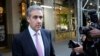 Michael Cohen leaves his apartment building on his way to Manhattan criminal court in New York, May 20, 2024. 