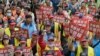 Workers, activists across Asia and Europe hold May Day rallies to call for greater labor rights 