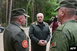 Belarus' President Alexander Lukashenko visits the country's air force central command, on May 15, 2023.