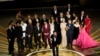 The cast and crew of "Everything Everywhere All at Once" accepts the award for best picture at the Oscars on March 12, 2023, at the Dolby Theatre in Los Angeles. 