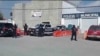 Police stand guard at their station in Ensenada, Mexico, May 2, 2024. Mexican authorities said that day that they had found tents and questioned people in the case of three tourists missing in Baja California. Three bodies were found in the area Friday.