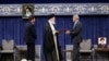 Reformist formally takes over as Iran's president after supreme leader offers endorsement 