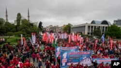 Union members march during Labor Day celebrations in Istanbul, May 1, 2024. Police in Istanbul detained dozens of people who tried to reach the city's main square, Taksim.