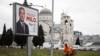 Bilbordi predsjedničkih kandidata Jakova Milatovića i Draginje Vuksanović Stanković u Podgorici (Foto: REUTERS/Stevo Vasiljevic)