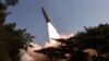 This picture taken May 17, 2024, and released from North Korea's official Korean Central News Agency on May 18 shows a test fire of a tactical ballistic missile toward the East Sea, at an undisclosed location in North Korea.