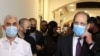 FILE - Palestinian Hamas Gaza Chief Yehya Al-Sinwar and head of the Egyptian general intelligence Abbas Kamel walk as they meet in Gaza, May 31, 2021. Kamel is leading a delegation to Israel on April 26, 2024, to discuss a cease-fire in Gaza.