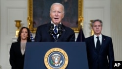 President Joe Biden speaks about the war between Israel and the militant Palestinian group Hamas, from in the State Dining Room of the White House in Washington, Oct. 10, 2023.