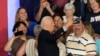 After speaking at a campaign rally at Sherman Middle School in Madison, Wisconsin, U.S. President Joe Biden takes a photo with supporters, July 5, 2024.